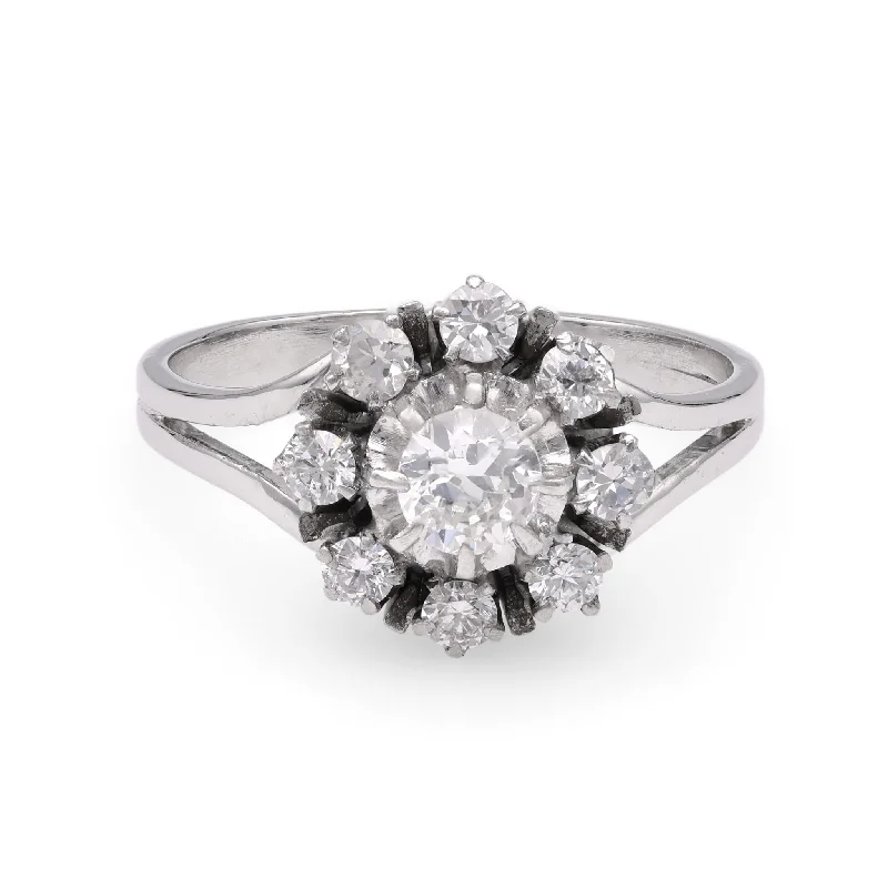 Pear - shaped diamond engagement ring with side baguette diamonds in 18K goldVintage Diamond White Gold Cluster Ring Pear - shaped diamond engagement ring with side baguette diamonds in 18K goldVintage Diamond White Gold Cluster Ring