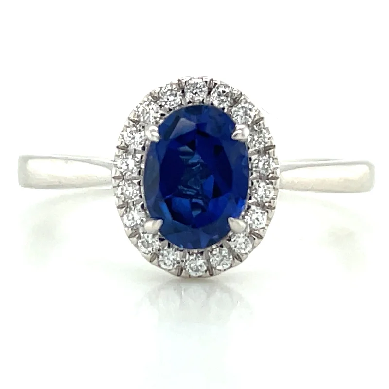 Sapphire Gemstone Rings in 18K White Gold with Diamond Accents for an Elegant Engagement14ct White Gold Laboratory Grown 1.02ct Oval Sapphire & 0.12ct Diamond Halo Ring Sapphire Gemstone Rings in 18K White Gold with Diamond Accents for an Elegant Engagement14ct White Gold Laboratory Grown 1.02ct Oval Sapphire & 0.12ct Diamond Halo Ring