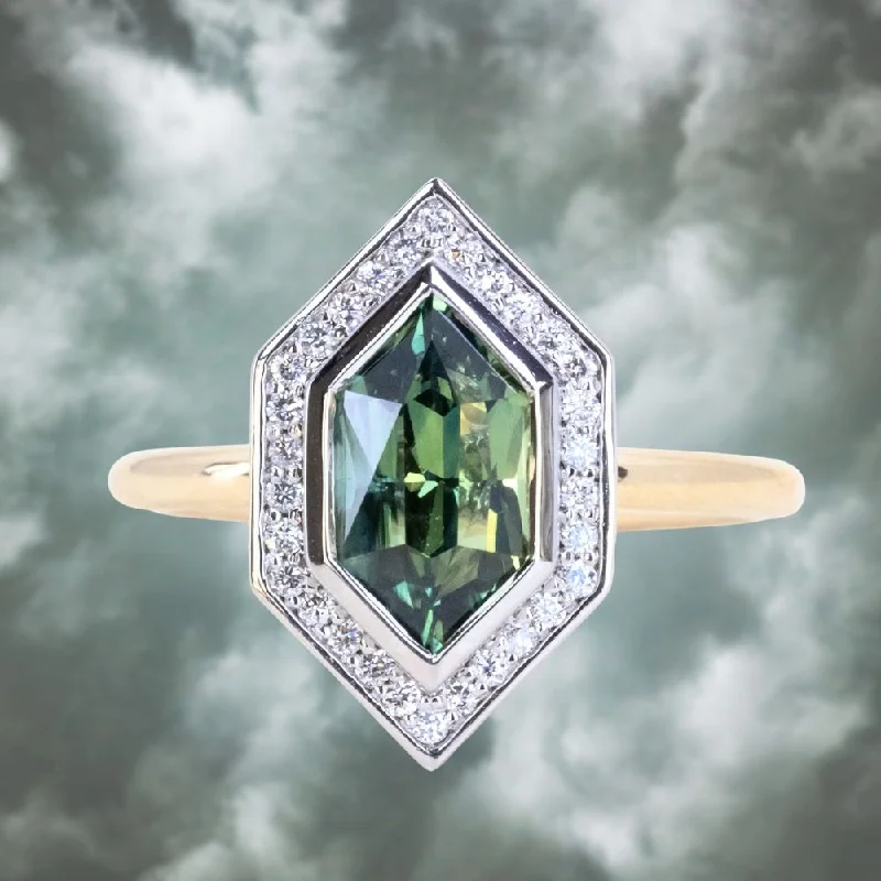 Alexandrite Gemstone Rings in Platinum with a Hidden Halo for a Rare and Luxurious Piece2.17ct Elongated Madagascar Teal Green Sapphire Bezel Set Diamond Halo Ring in Two-tone Platinum and Yellow Gold Alexandrite Gemstone Rings in Platinum with a Hidden Halo for a Rare and Luxurious Piece2.17ct Elongated Madagascar Teal Green Sapphire Bezel Set Diamond Halo Ring in Two-tone Platinum and Yellow Gold