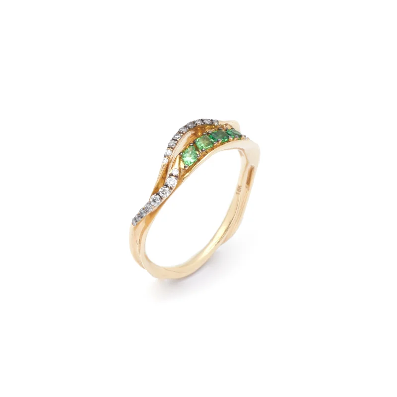 Iolite Gemstone Rings in 10K Gold with a Twisted Band for a Distinctive and Stylish AccessoryInhale Stackable 18K Gold Ring w. Tsavorites Iolite Gemstone Rings in 10K Gold with a Twisted Band for a Distinctive and Stylish AccessoryInhale Stackable 18K Gold Ring w. Tsavorites