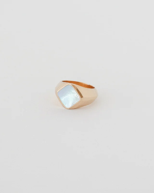 Iolite Gemstone Rings in 10K Gold with a Twisted Band for a Distinctive and Stylish AccessoryGALACTIC RING | MOTHER OF PEARL Iolite Gemstone Rings in 10K Gold with a Twisted Band for a Distinctive and Stylish AccessoryGALACTIC RING | MOTHER OF PEARL
