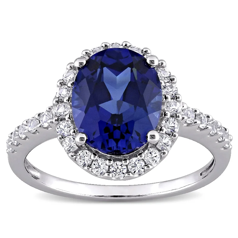 Emerald Gemstone Rings Set in Platinum with Filigree Work for a Vintage - Inspired LookMiadora 10k White Gold Oval-cut Created Blue and White Sapphire Halo Engagement Ring Emerald Gemstone Rings Set in Platinum with Filigree Work for a Vintage - Inspired LookMiadora 10k White Gold Oval-cut Created Blue and White Sapphire Halo Engagement Ring