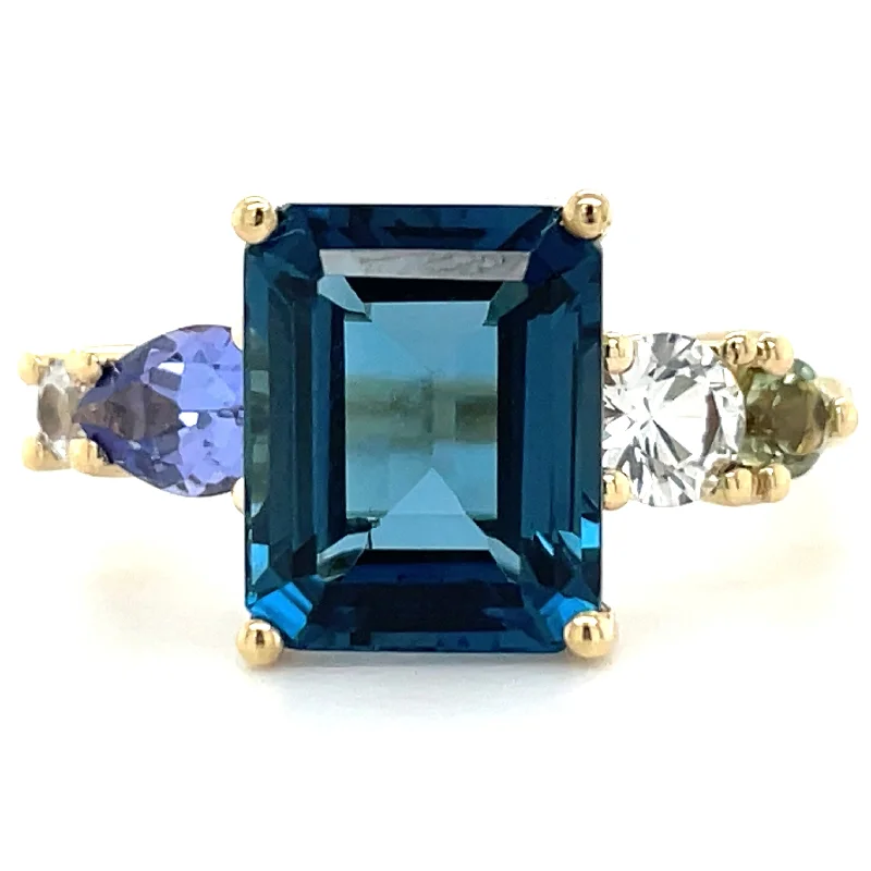 Aquamarine Gemstone Rings in 9K Gold with a Bezel Setting for a Modern and Secure Fit9ct Yellow Gold Earth Grown London Blue Topaz, Green Tourmaline, Tanzanite & White Sapphire Ring Aquamarine Gemstone Rings in 9K Gold with a Bezel Setting for a Modern and Secure Fit9ct Yellow Gold Earth Grown London Blue Topaz, Green Tourmaline, Tanzanite & White Sapphire Ring